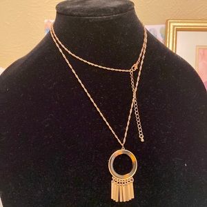 Long mid century modern style tortoise shell necklace